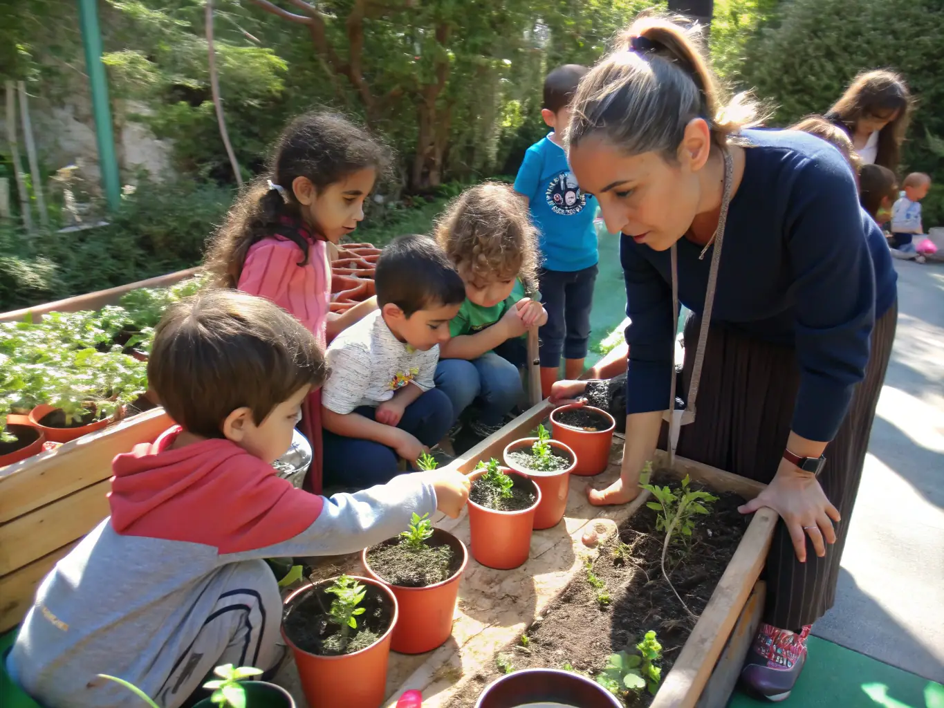 A kindergarten class is engaged in a hands-on science experiment, observing plants growing in small pots, with a teacher guiding them through the process.
